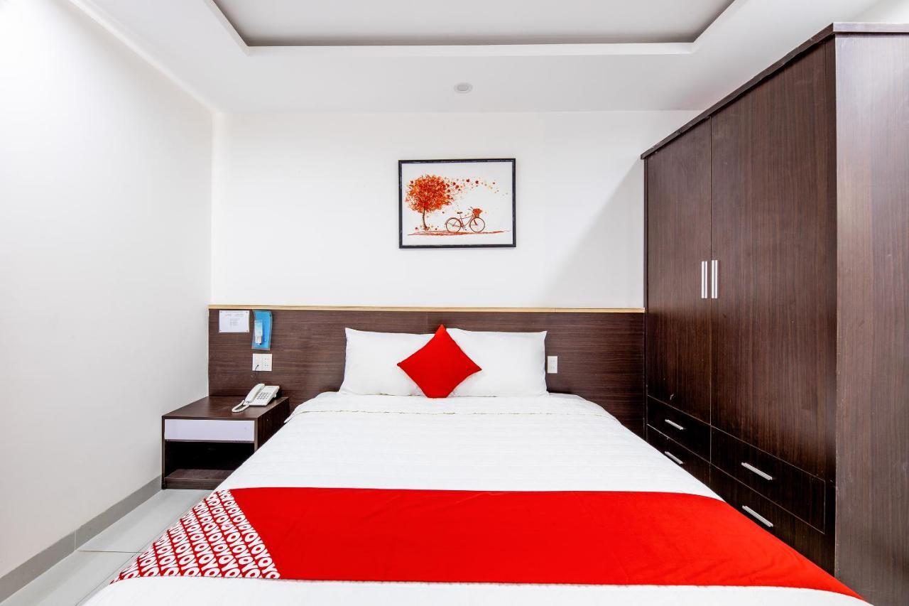 Oyo 372 Vy Ha Hotel Хошимин Экстерьер фото