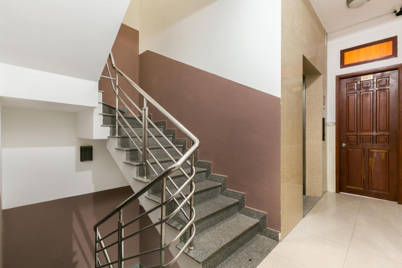 Oyo 372 Vy Ha Hotel Хошимин Экстерьер фото